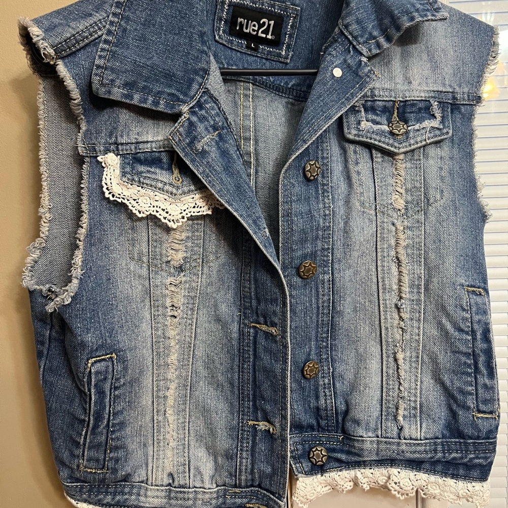 Denim vest with lace embellishments